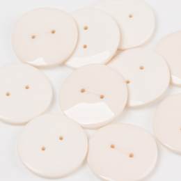 Bouton brillant surface vague à trous - 408